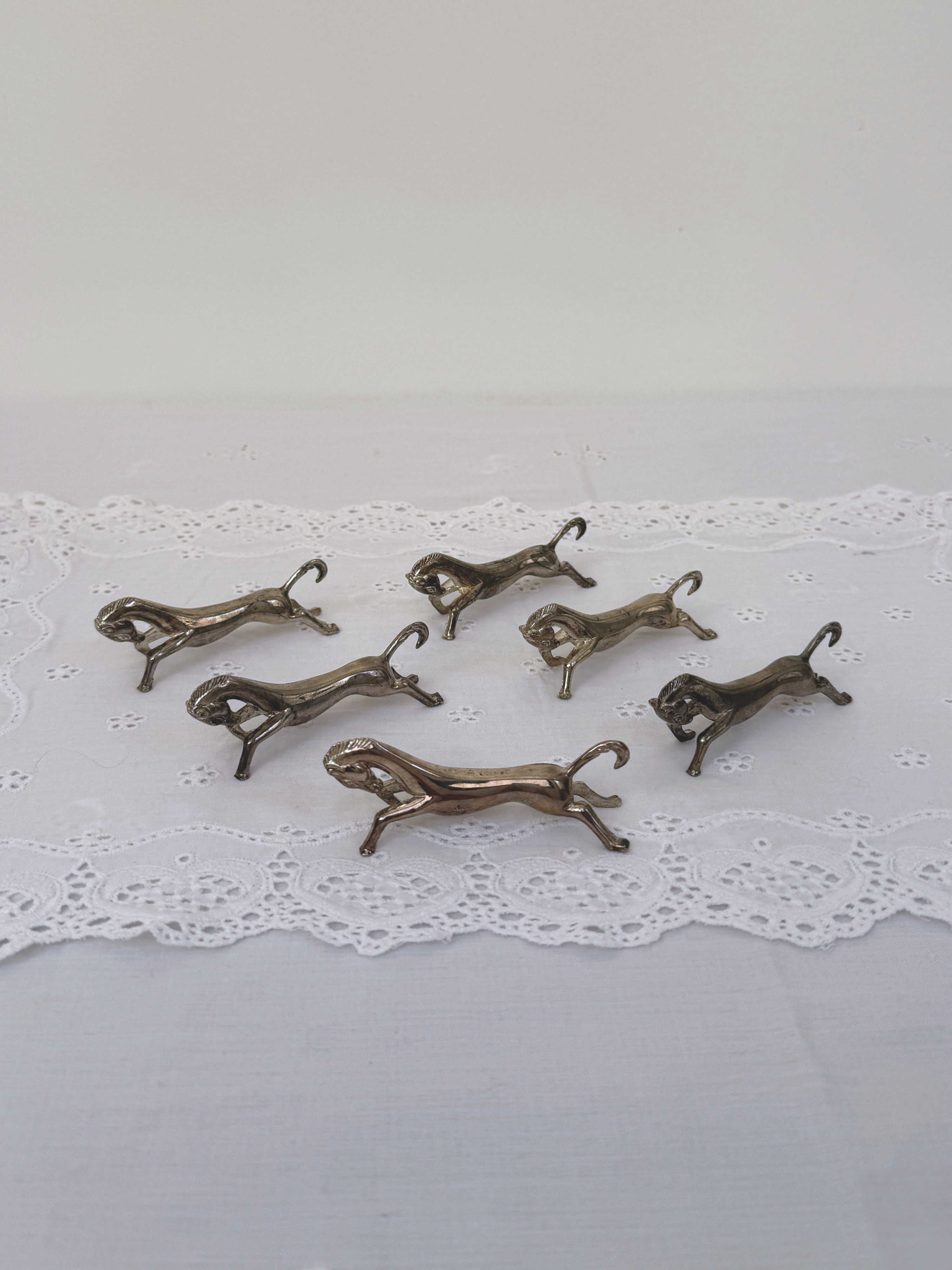 SILVER PLATED HORSE KNIFE RESTS
