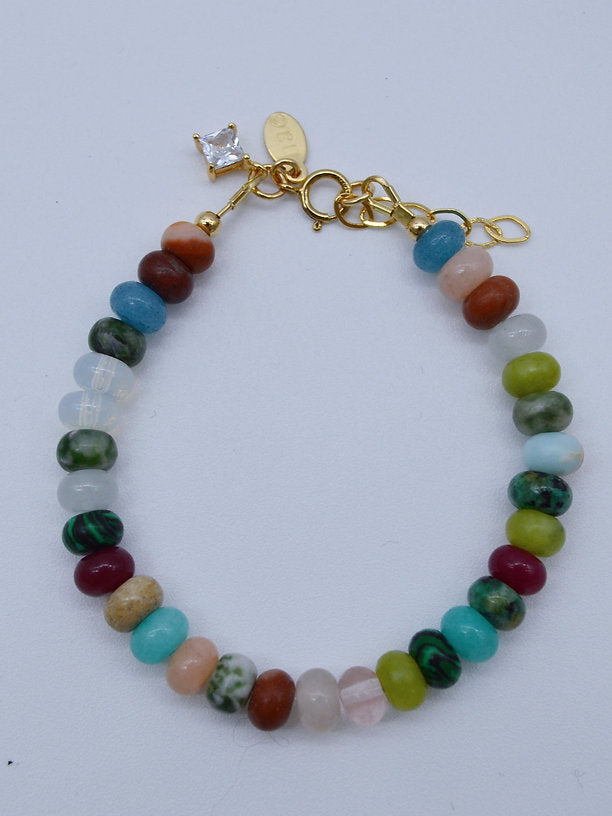 Colorful bracelet made with mixed gemstone beads, gold-filled details, and a shiny zirconia stone. Length: 17-19cm Bead size: 6m | Rainbow Bracelet | Best Handmade Jewelry Products | HolaAmorEstudios