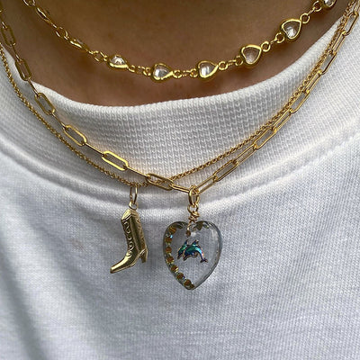 This necklace has the potential to become your everyday favorite while being a bit extra and never boring🐬 Be prepared to get a lot of compliments for it. Length: 40cm Medium thick 14k gold filled necklace with a stamped glass charm. | Crystal Dolphin Necklace | Handmade Jewelry Items | HolaAmorEstudios